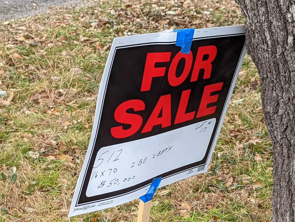 Land For sale by owner sign
